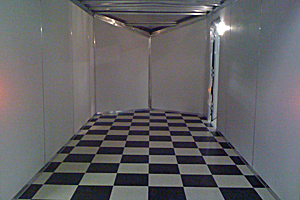 Black and white tile floor w/ white vinyl walls